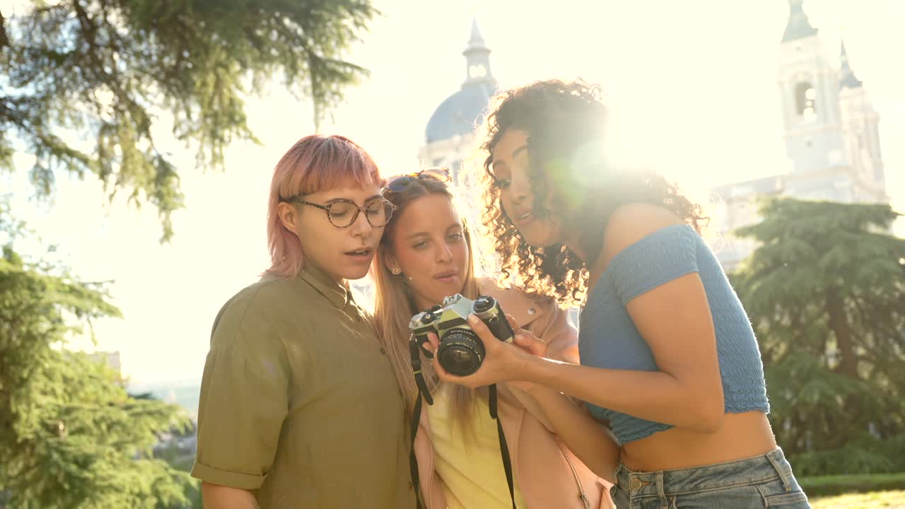 Friends sightseeing with a camera