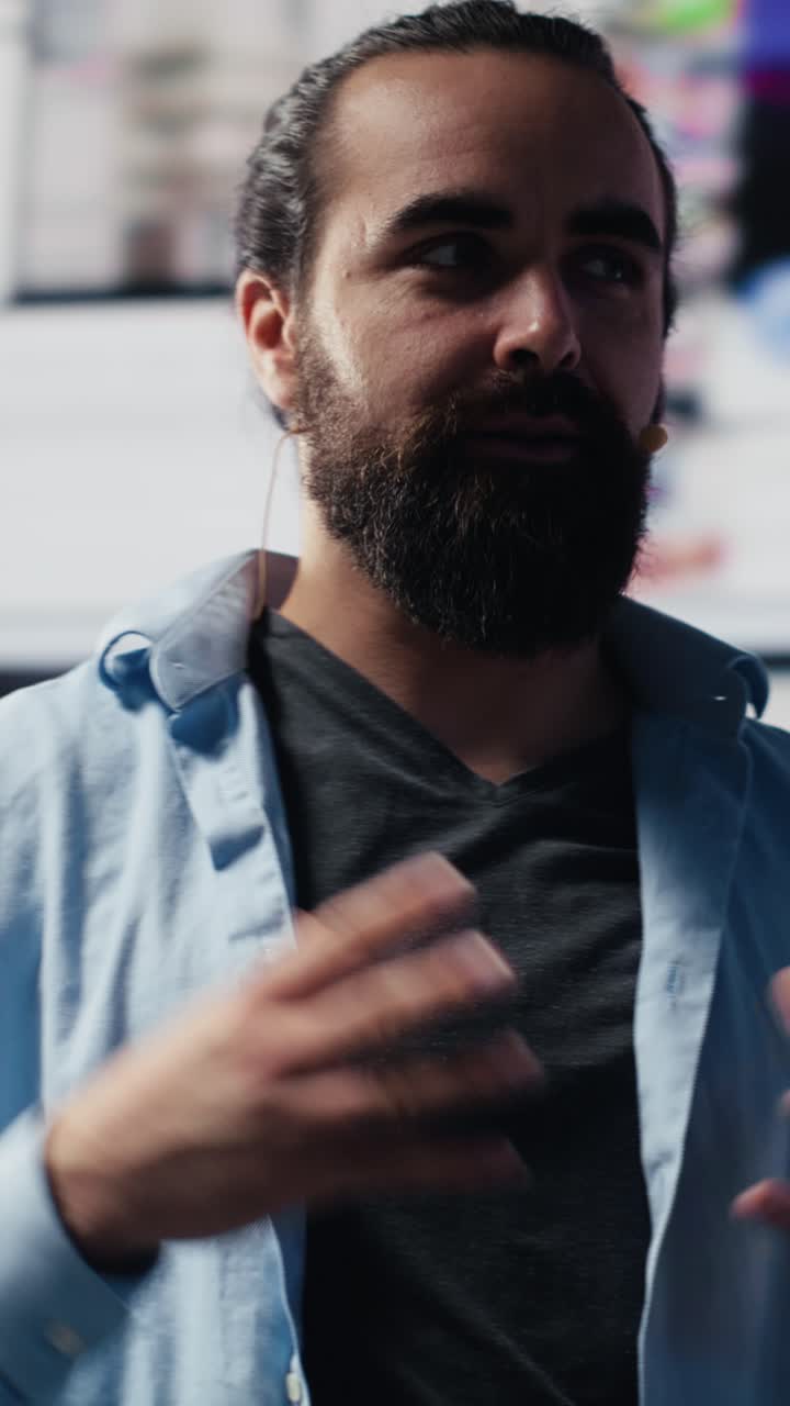 Vertical Video Male trend setter hosts a live presentation offering insight for innovation