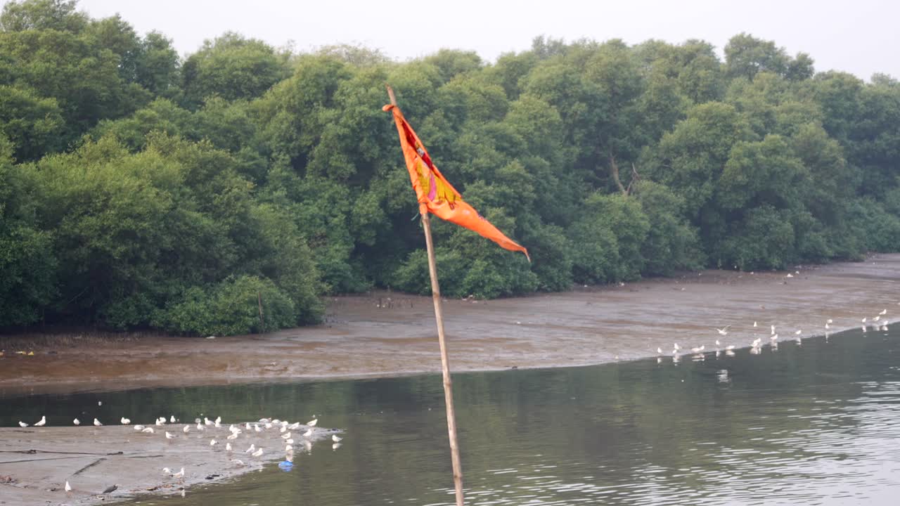 red flag flying on the air