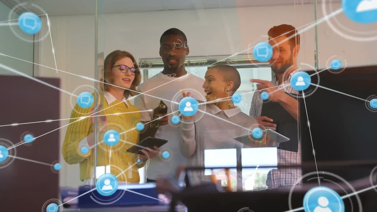 Web of connection icons against people working in an office