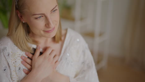 pregnant woman holding ultrasound image close up