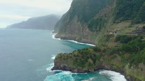 coast line miradouro do véu da noiva waterfall madeira drone shot cloudy mountains with waves panorama sky ocean, beach