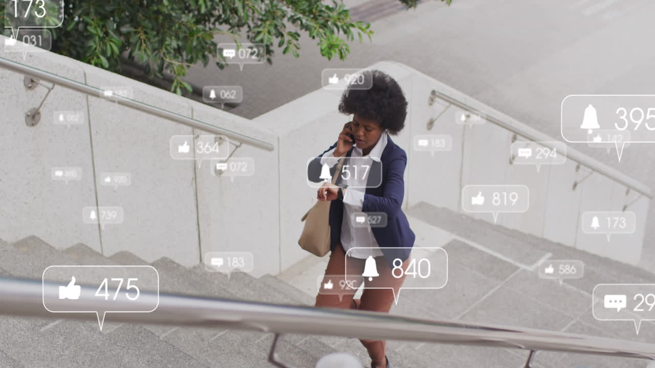 Animation of social media data processing over african american woman using smartphone in city