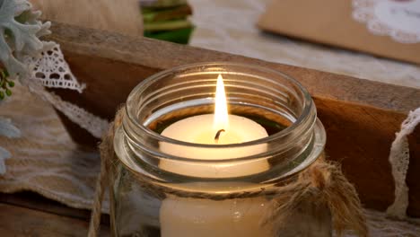 Shot-of-Flower-and-candle-used-for-a-funeral