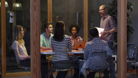 Late-Night-Meeting-Around-Table-In-Design-Office-Shot-On-R3D