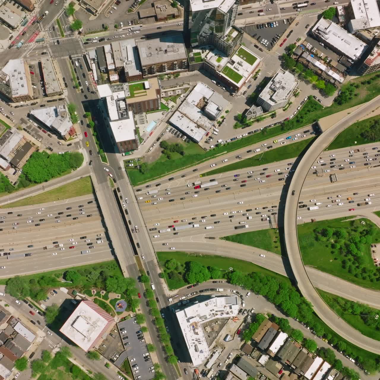 Crazy flow of cars on the roads of Chicago. Transport moving in the busy area. Beautiful sight of the city from birds perspective