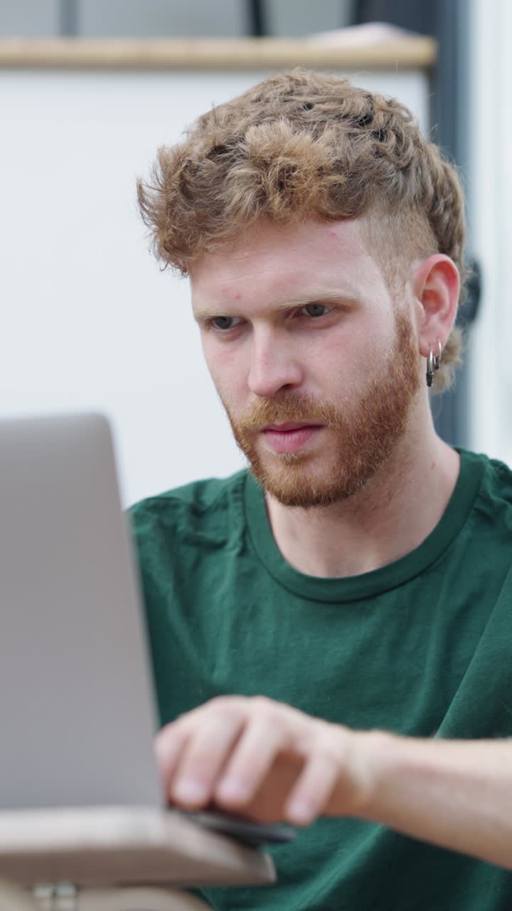 Man using laptop and thinking