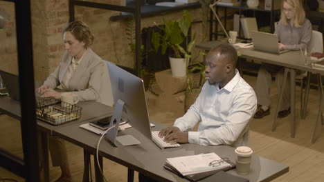 top view of american man and women employees working in the office 1