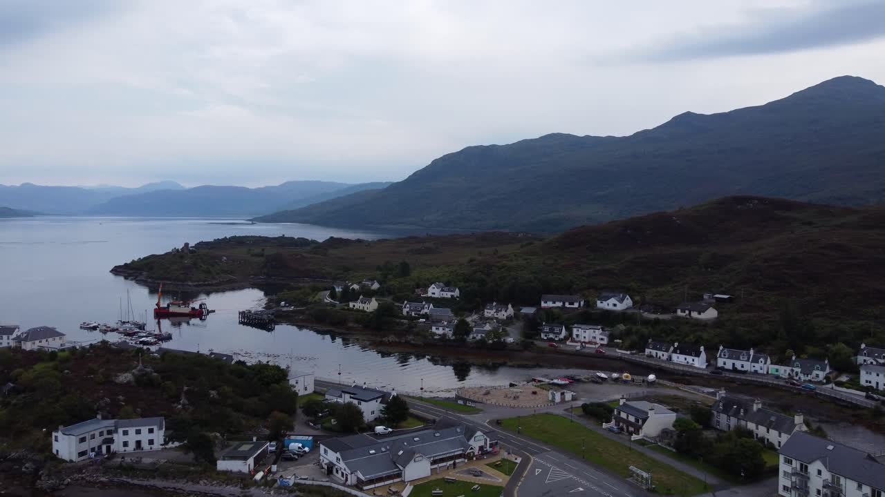 Kyleakin Village on Isle of Skye near Skye Bridge, West Coast of Scotland, Highlands, Aerial Drone 4K HD Footage Fly Over