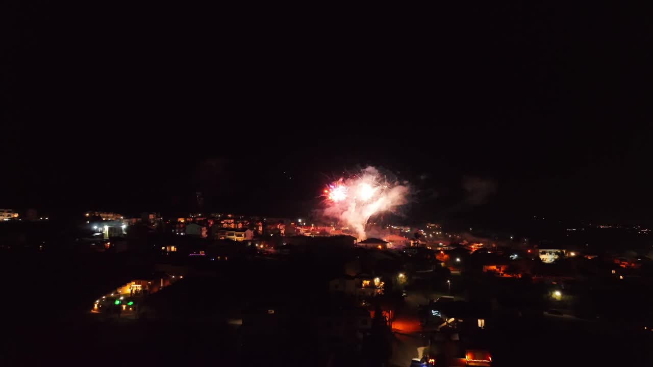 Amazing fireworks during new year's eve aerial view with drone.