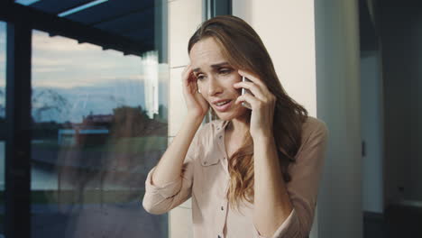 business woman yelling on mobile. closeup shocked woman talking on phone.