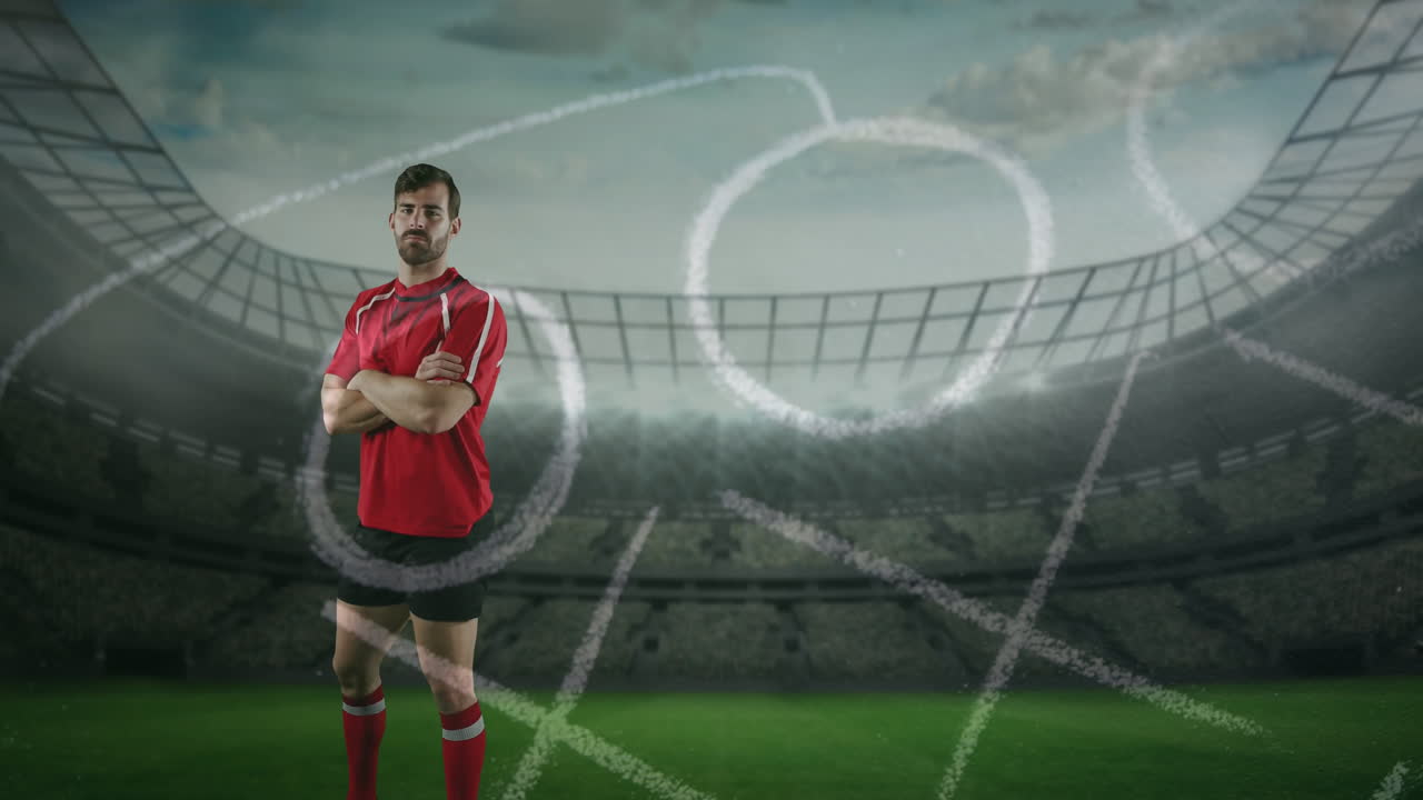 프로 럭비 선수 가 스포츠 경기장 앞 에 서 있는 4k