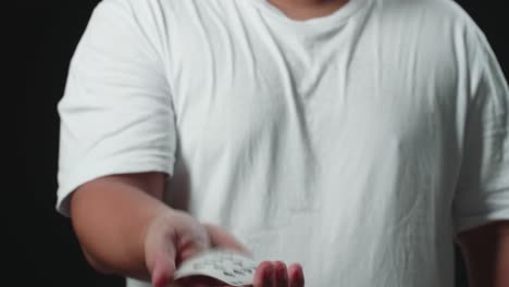 magician showing his trick with usual cards, magician changes card