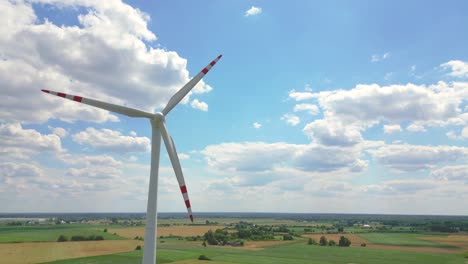 Aerial-view-of-powerful-Wind-turbine-farm-for-energy-production-on-beautiful-cloudy-sky-at-highland