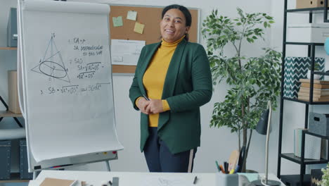 teacher presenting a math lesson in a classroom