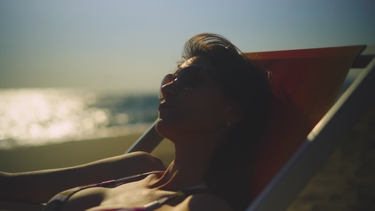 Woman Relaxing on the Beach