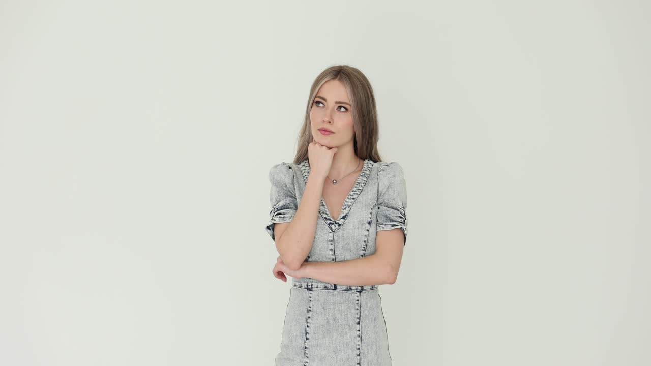 Young Woman in Dress Thinking