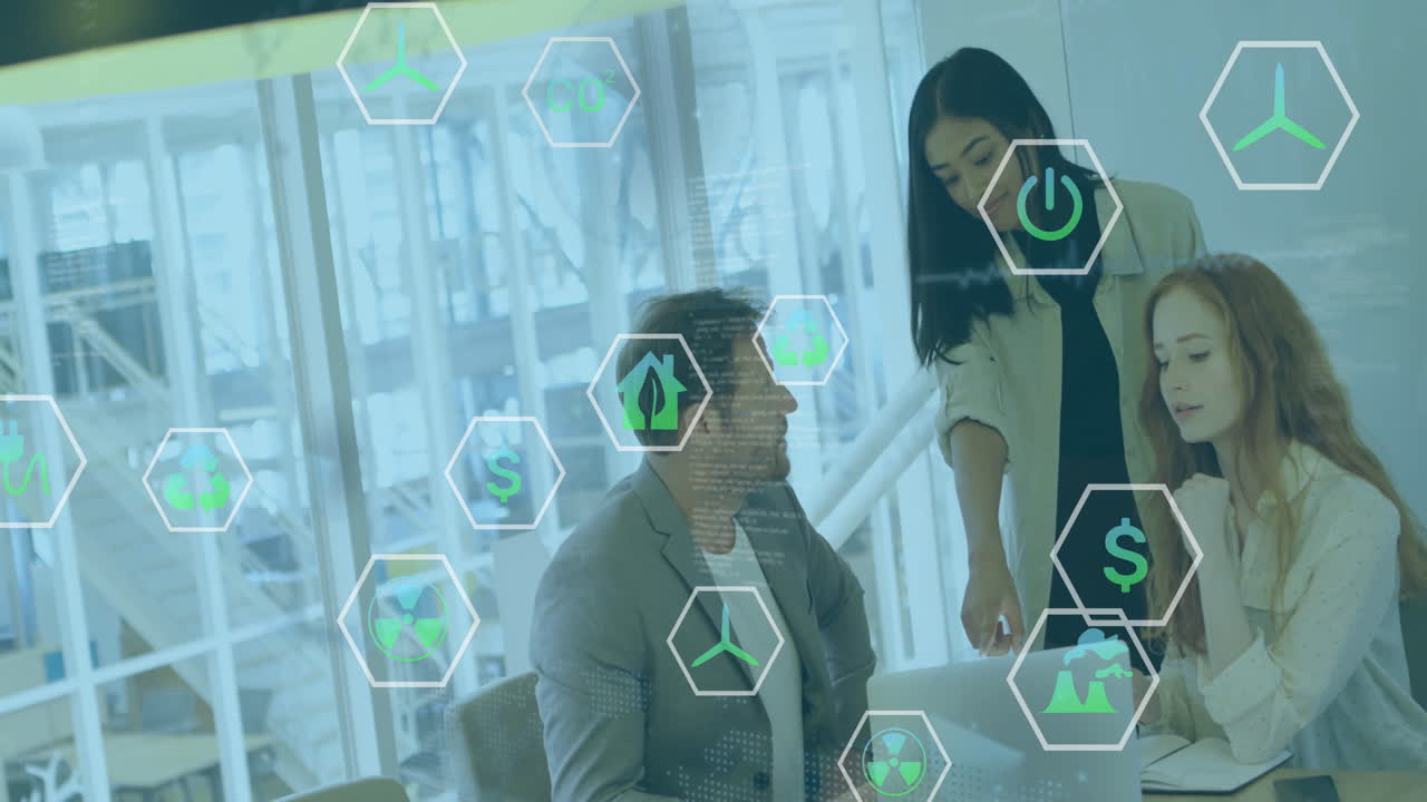 Business team collaborating at office with financial icons overlay animation