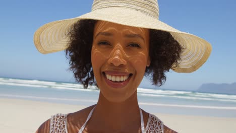 happy woman in hat at beach 4k