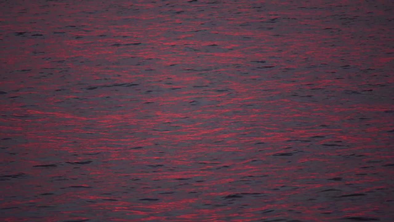 Reflections on the water of the sunset during golden hour