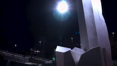 modern sculpture at night