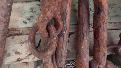 a glimpse of weathered fishing anchors and assorted gear from a quaint seaside village, portraying the essence of fishing and coastal suburban living