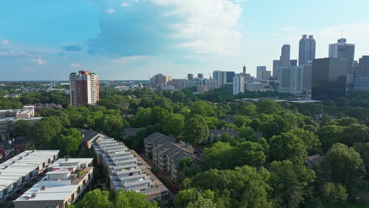 Aerial view of Atlanta city skyline buildings with parks and green trees, Georgia