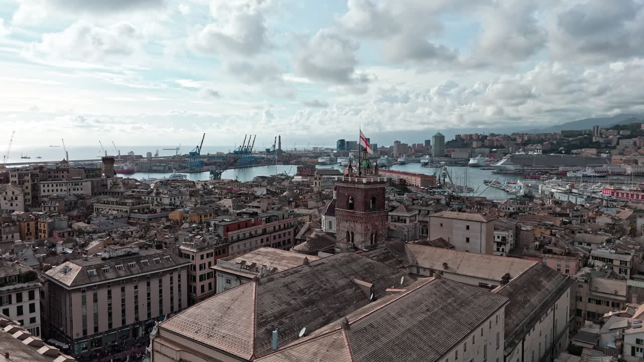 Aerial skyline view over Genoa Port and St Georges cross flag on Grimaldina
