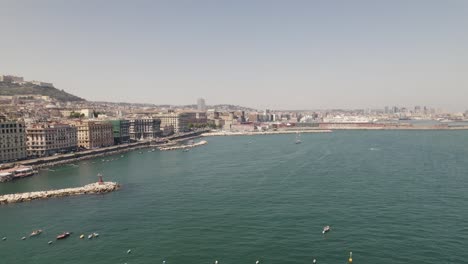 Arcing-Aerial-Shot-Of-The-Napoli-Bay-Area-During-The-Day