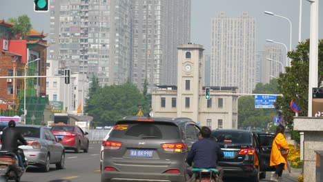 sunny day changsha city center traffic street circle clock tower sidewalk panorama 4k china