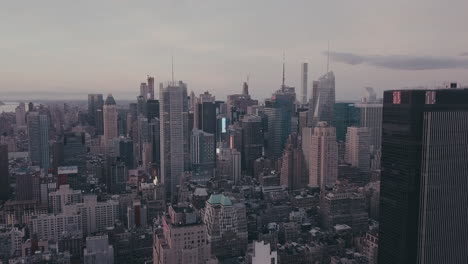 AERIAL:-Flight-into-Midtown-Manhattan-with-Times-Square-Advertising-Flashing