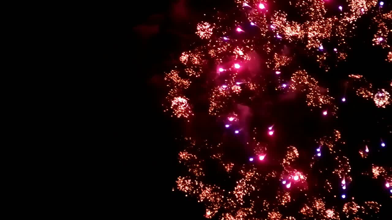 Fireworks painting the night sky in multiple bright colors during New Year's Eve 2019 at I.T. Park, Cebu City, Philippines.
