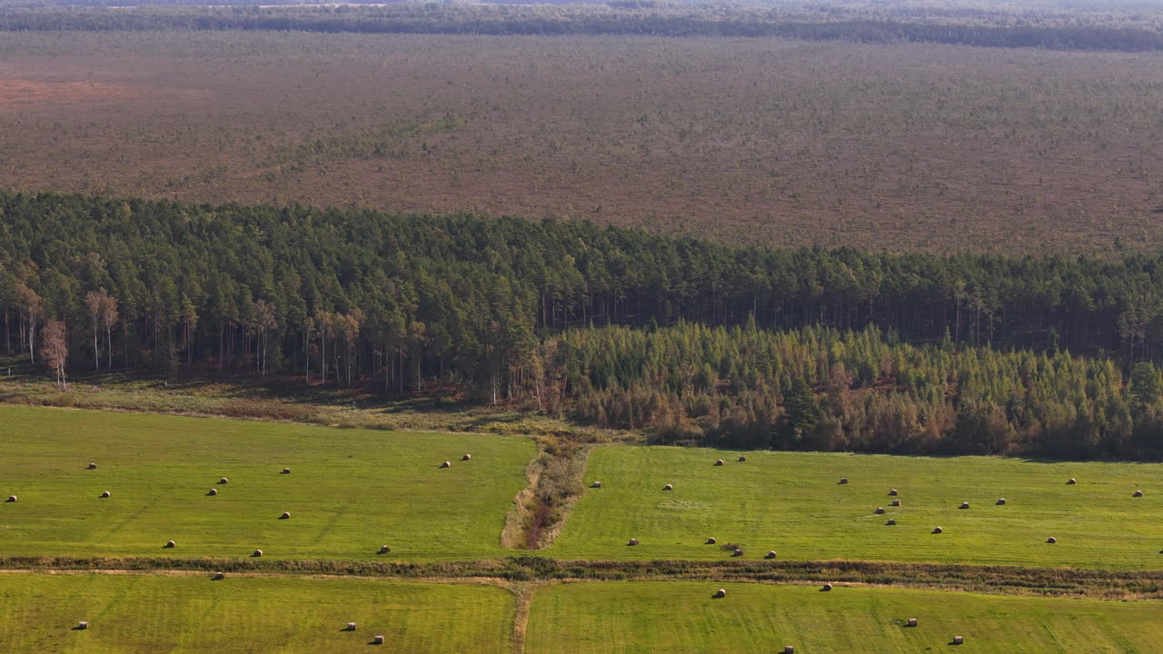 Aerial Drone Rotation Above The Kurzeme Region Of Latvia, An Area Made Up Of Farms Along The Baltic Sea Coast Of Europe.