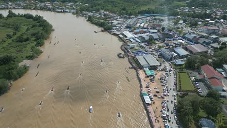 drone view at lundu town during summer, in conjunction of regatta traditional long boat race batang kayan river, with car and bike show.
#regatta