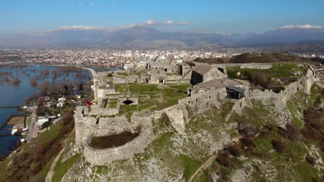 fortress stone walls surrounding ancient buildings inside rozafa castle in albania