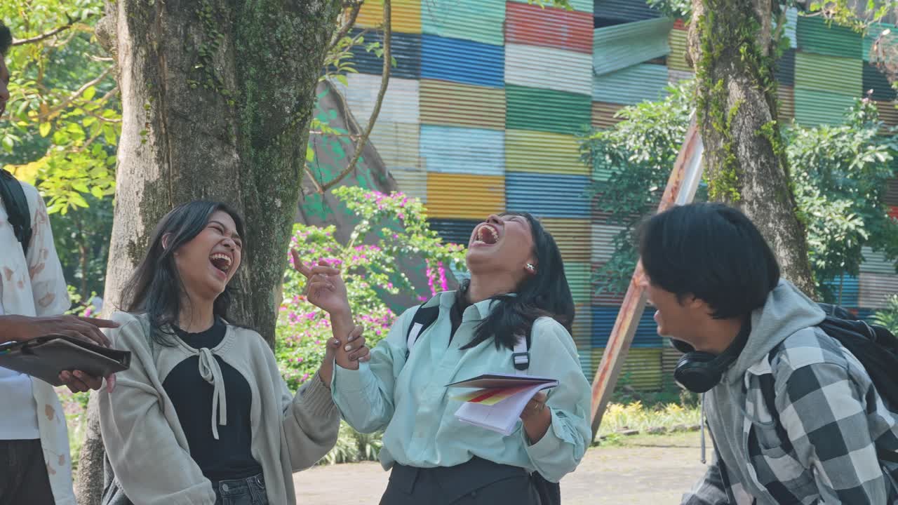 Group of Multiracial Asian University Best Friends Laughing Together Outdoor