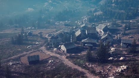 Old-wooden-village-on-the-rocky-mountain-background