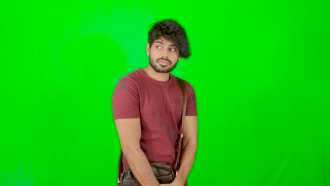 Indian-man-shy-with-green-background-Indian-green-screen