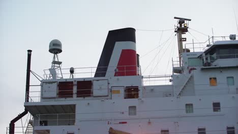 Lake-Freighter-traveling-through-canal-in-Port-Colborne,-Ontario