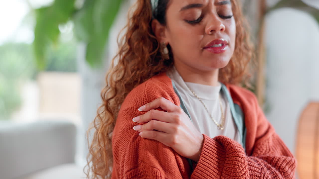 Woman Experiencing Shoulder Pain