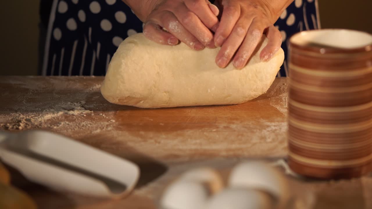 Woman Kneading Dough