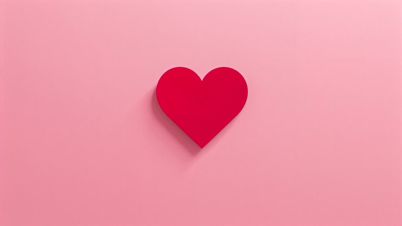 Grafica pulsante a forma di cuore rosso che reagisce al primo fotogramma su sfondo rosa pastello, ombra portata