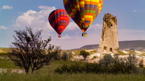 cinemagraph of hot air balloons rising over a karst in cappadocia, turkey