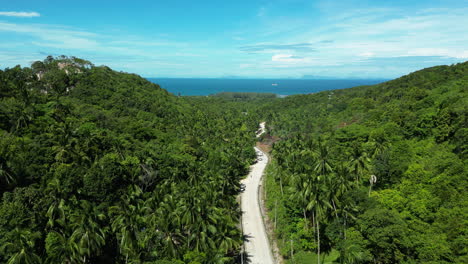 traveling through highlands of party island koh phangan, aerial drone view