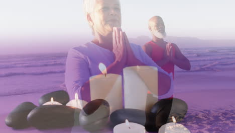 animation of senior african american couple practicing yoga at beach over candles