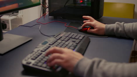 Closeup-of-player-hands-using-RGB-keyboard