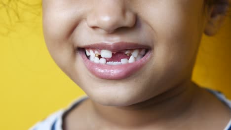 child with missing tooth