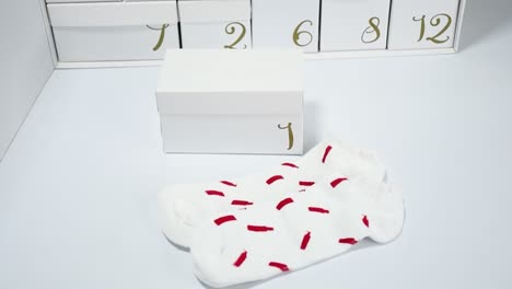 white socks with red stripes in christmas advent calendar