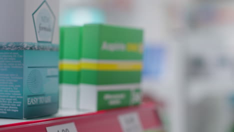 selective focus of supplements packages on display at store