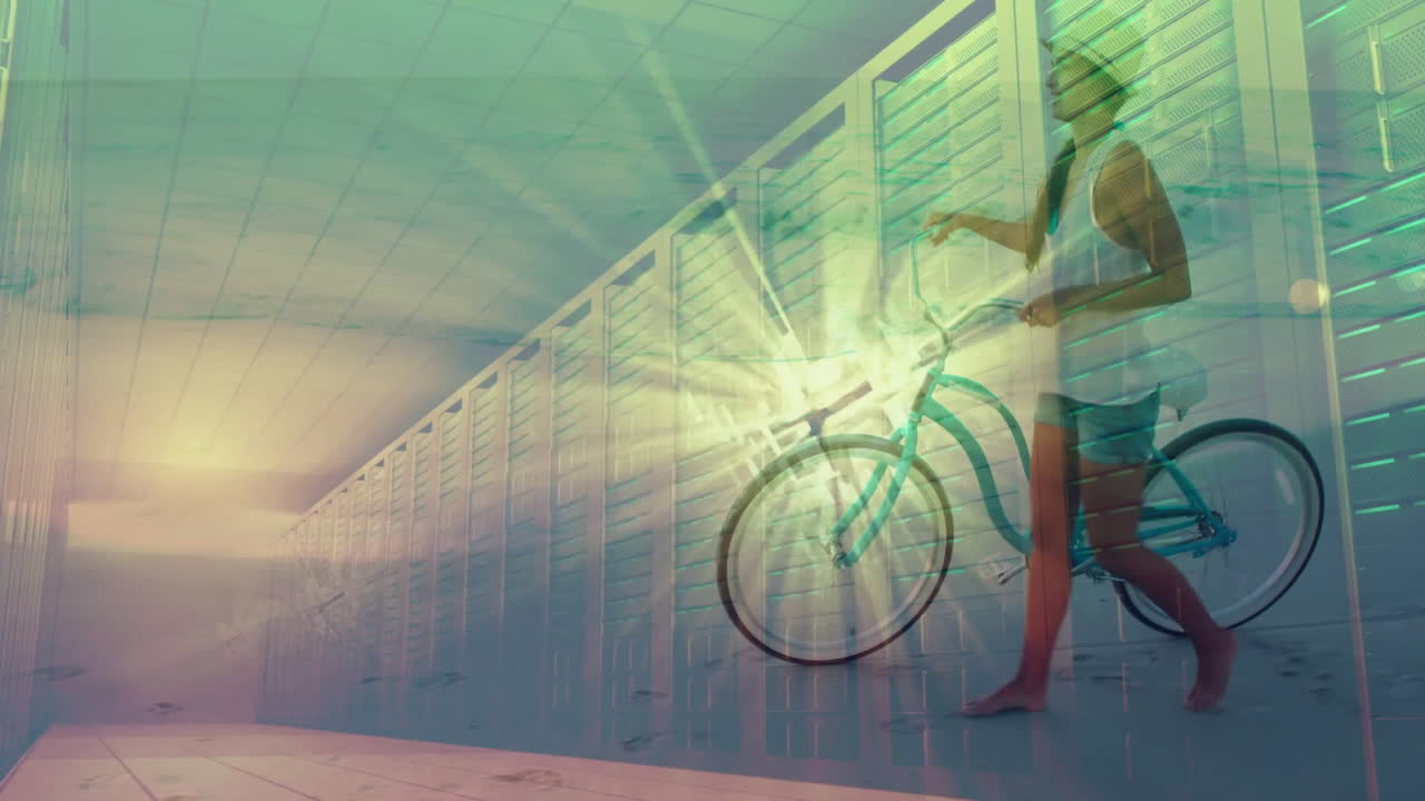 Walking bicycle on beach, person with animation of geometric patterns overlay